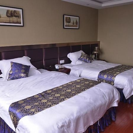 Chongqing Xinhao Theme Hotel Bagian luar foto