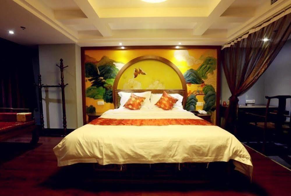 Chongqing Xinhao Theme Hotel Bagian luar foto