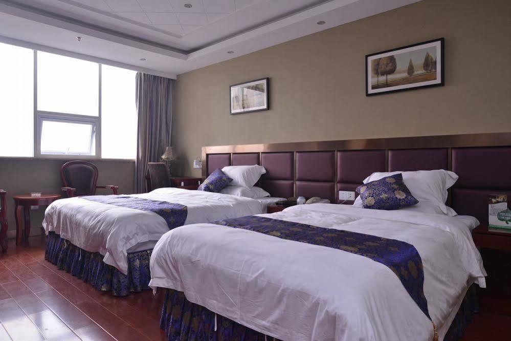 Chongqing Xinhao Theme Hotel Bagian luar foto