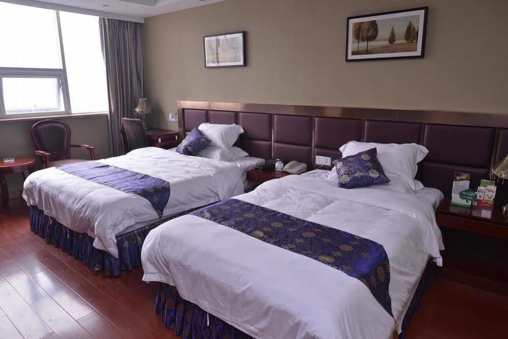 Chongqing Xinhao Theme Hotel Bagian luar foto