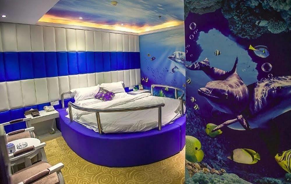 Chongqing Xinhao Theme Hotel Bagian luar foto